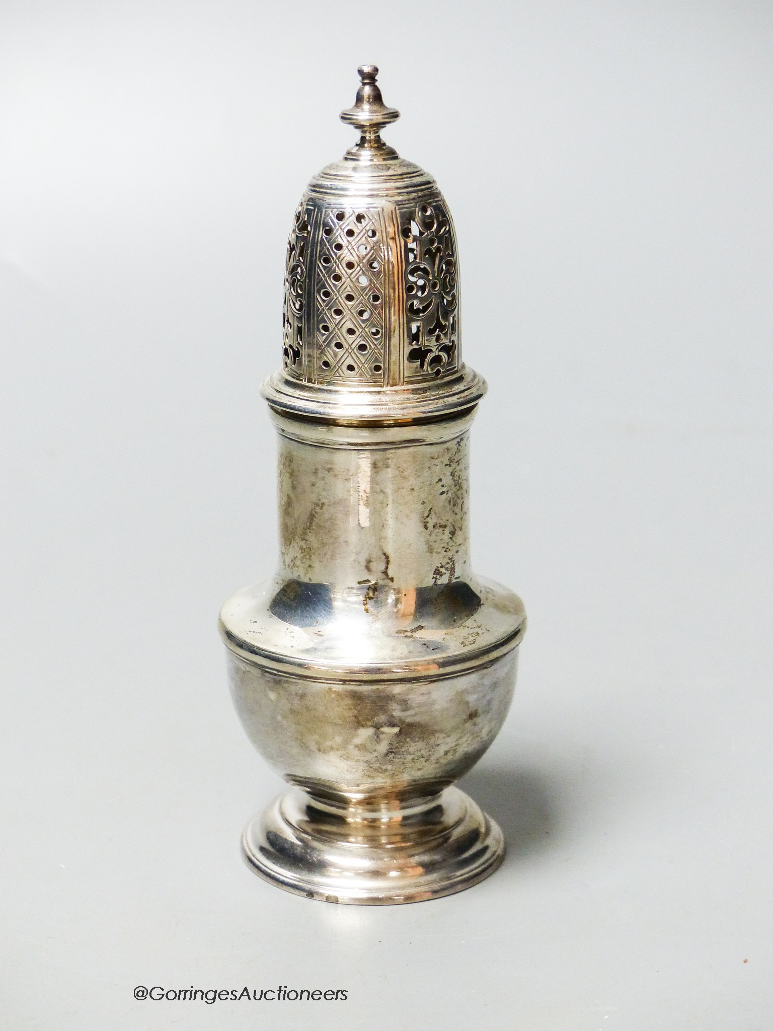 A George II silver baluster caster, Samuel Wood, London, 1730, 13.4cm, 3.5oz.